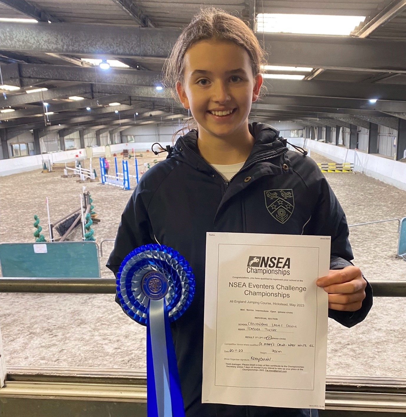 Year 8 student Isodora presents her NSEA Eventers Challenge certificate